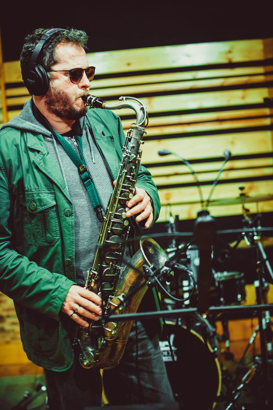 Saxophonist in a recording studio — close-up portrait