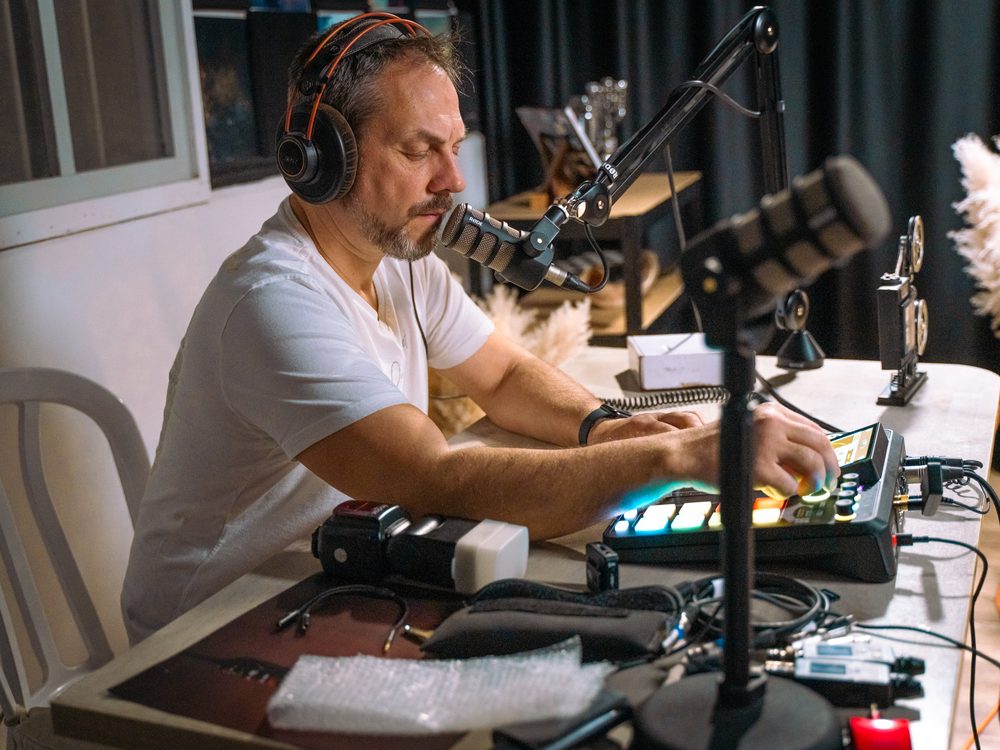 Sound engineer at the console during broadcast